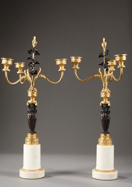 Pair of candelabras in bronze.<br/>
Directoire period.