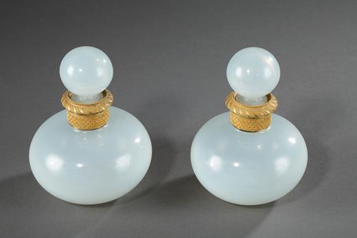 Pair of Charles X white Opaline perfume bottles.