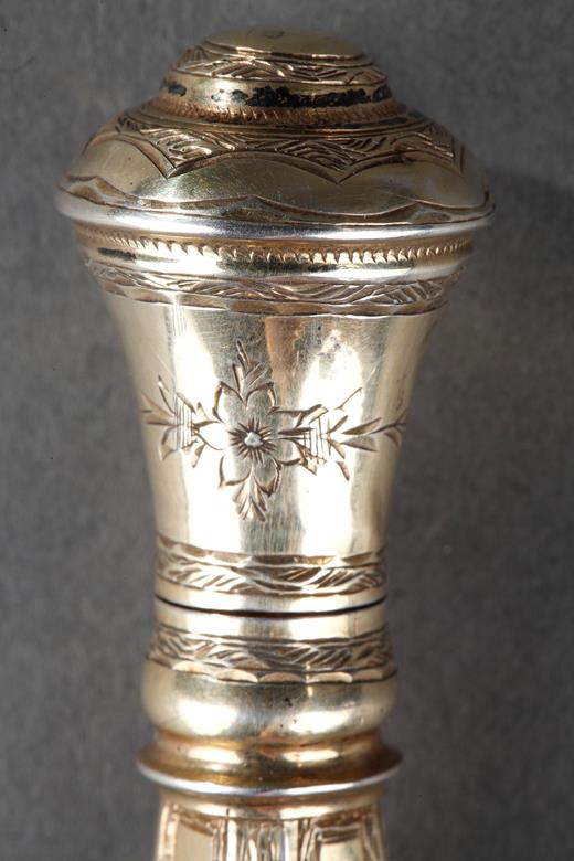 A mid-19th century silver mounted glass scent bottle. 