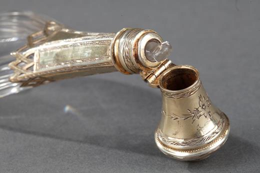 A mid-19th century silver mounted glass scent bottle. 