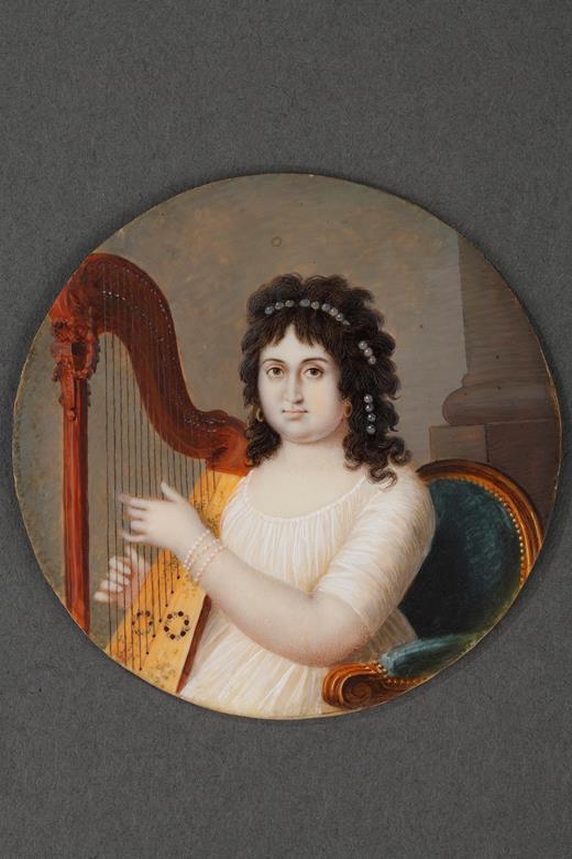 Miniature on ivory of a women playing the harp
