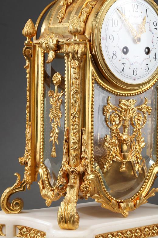 Louis XVI style clock in gilt bronze, cristal and white marble , Napoleon period