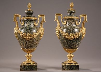 A pair of Louis XVI style GILT-BRONZE MOUNTED GREEN MARBLE VASES. 