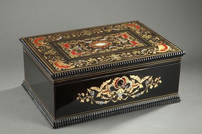 A mid-19th century wooden casket inlaid with mother-of-pearl
