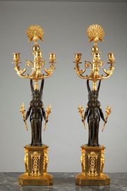 Early 19th century pair of patinated and gilt bronze three-light candelabra