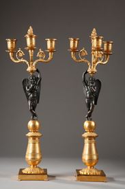 PAIR OF GILDED AND PATINATED BRONZE CANDELABRAS.<br/>
French Restauration. 
