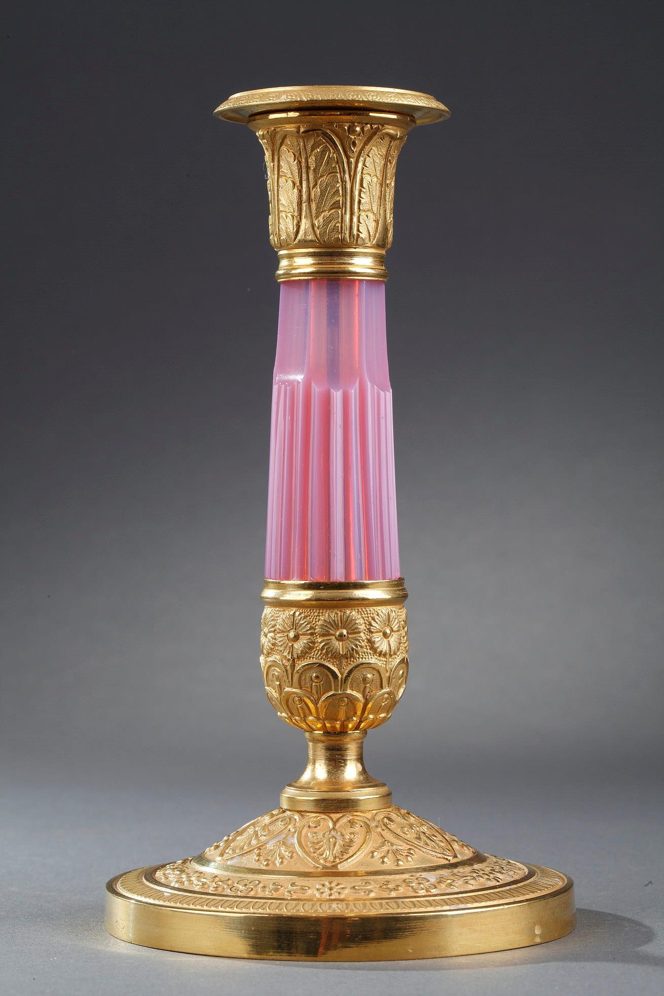 Early 19th century candelstick in gilded bronze and opaline. 