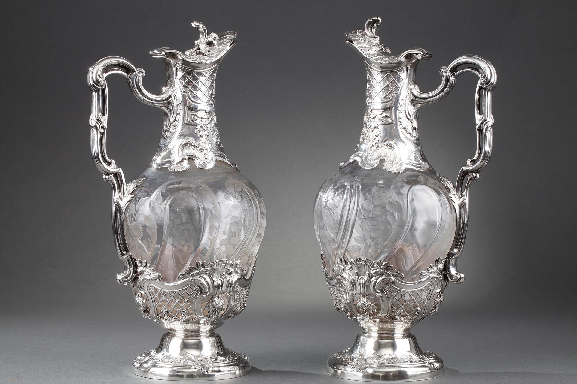 19th century Pair of silver ewers and engraved crystal. 