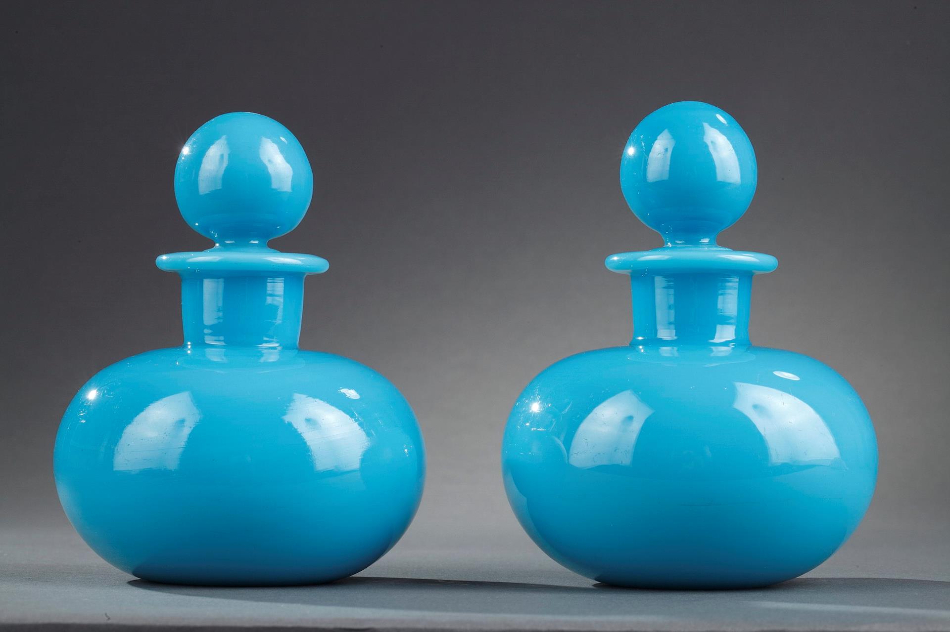 Pair of Charles X perfume bottles in blue opaline, 19th century