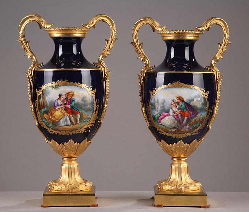 End of 19th century pair of gilt bronze and porcelain vases. 