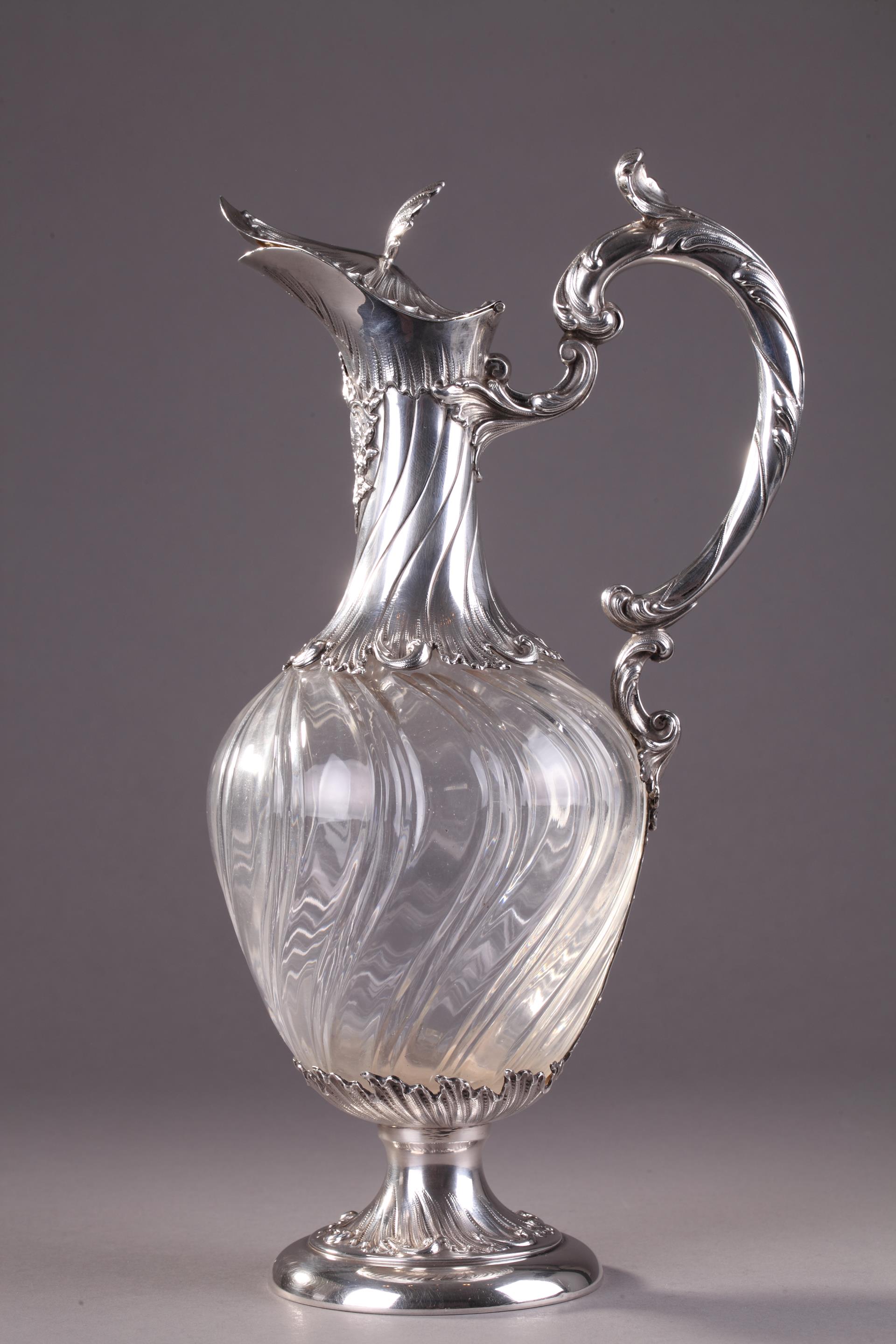 Late 19th century, cut-crystal and silver ewer.